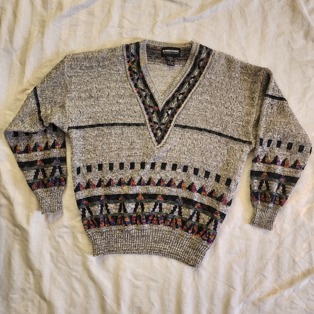 Stylish V-Neck Sweater with Geometric Accents